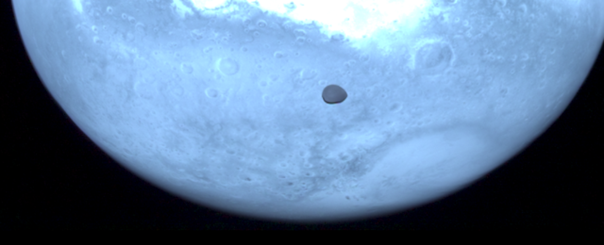 Image of Deimos with Mars on the background, obtained with the HyperScout-H instrument on board the Hera spacecraft Image of Deimos with Mars on the background, obtained with the HyperScout-H instrument on board the Hera spacecraft
