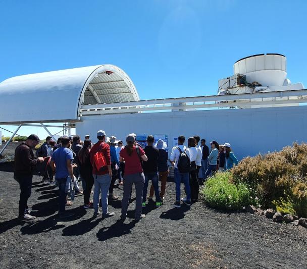 Attendees at the Open Doors Days 2019 at the Teide Observatory in front of the QUIJOTE Experiment. Credit: IAC. 
