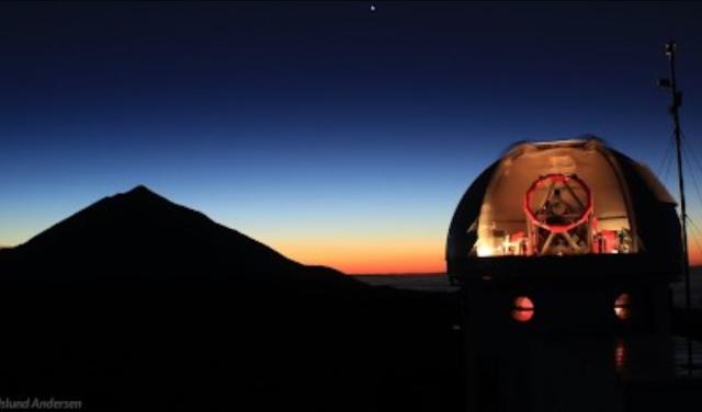 The SONG Telescope at Teide Observatory in morning light during a full moon night. (Photo: Uli Fehr, www.fehrpics.com)  