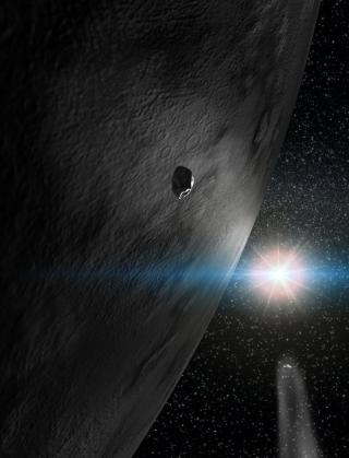 Artist conception of asteroid 24 Themis and two small fragments of this dynamical family, which resulted from a large impact more than one billion years ago. Note that one of the small fragments is inert (as most asteroids are) and the other has a comet-l Artist conception of asteroid 24 Themis and two small fragments of this dynamical family, which resulted from a large impact more than one billion years ago. Note that one of the small fragments is inert (as most asteroids are) and the other has a comet-l