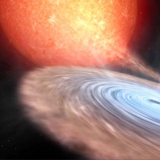 The illustration is inspired in the system V404 Cygni, and represents both the companion star and the accretion disc surrounding the black hole, as well as ejection processes in the form of a jet and wind. Black hole in outburst